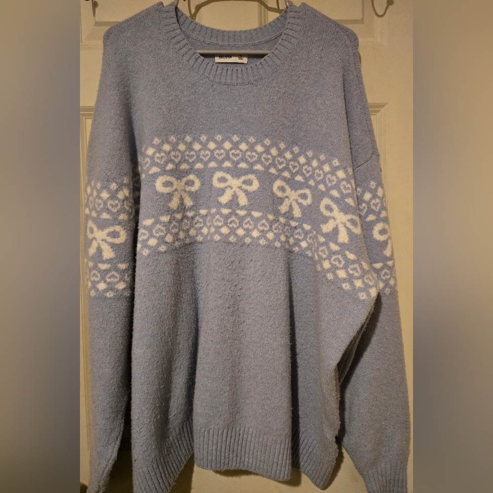 Blue Sweater with White Bow Pattern